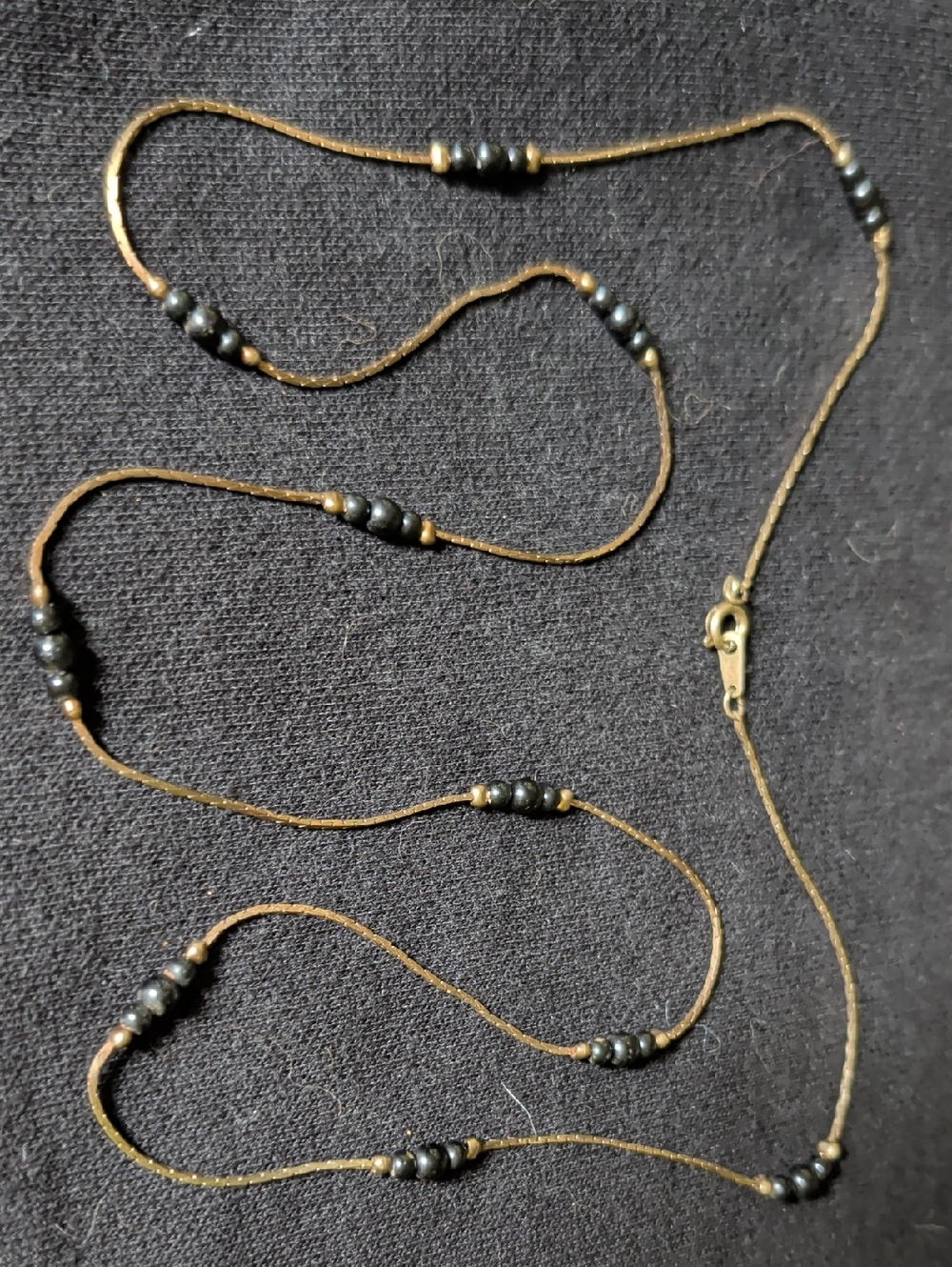 Retro Gold-Tone Necklace with Spaced Black Bead Accents